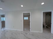 Bedroom 1 (left), bedroom 2 and restroom 2 (middle), restroom 1 (right) - 3241 Prospect Ave