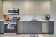 Kitchen at The Jagger Apartments in West Los Angeles featuring Studios, One Bedroom Apartments and P - The Jagger Apartments