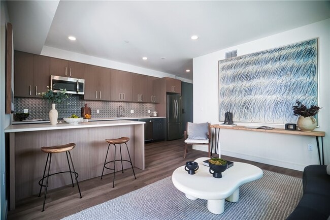 Building Photo - 5771 Carlton Way Unit 706