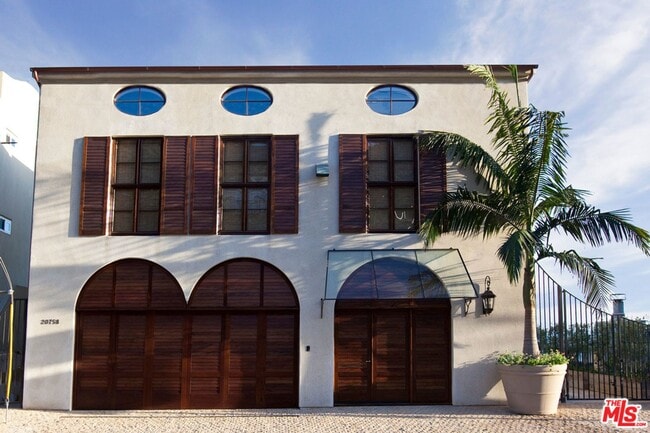 Building Photo - Architectural Beachfront Retreat on Las Flores Sands