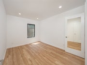 2nd bedroom/mirrored closet door - 10618 Ayres Ave Unit Duplx