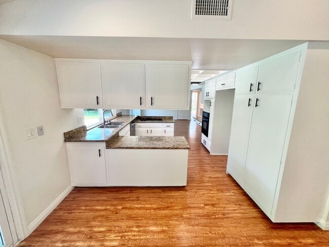 Photo - Spacious 3BR Single-Story Residence | Central Air, Fireplace, Private Backyard Retreat