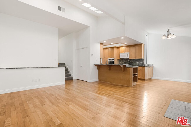Building Photo - 13350 Maxella Ave Unit 3