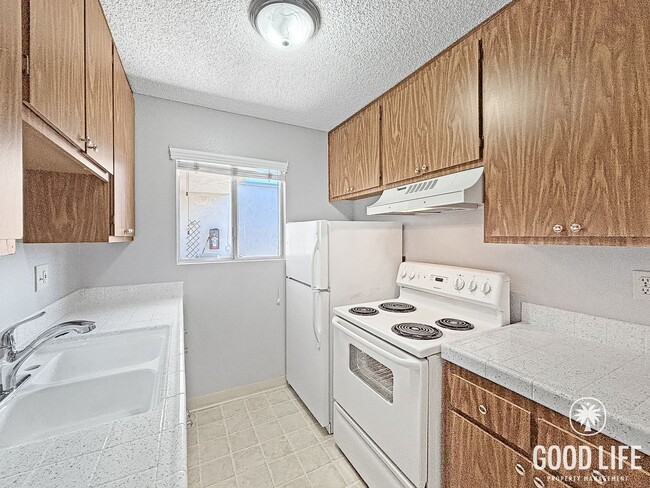 Photo - Comfortable 1BD/1BA Upper-Level Condo in North Park with Reserved Parking & On-Site Laundry Unit 4