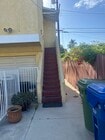 Stairway to Entrance - 1132 N Heliotrope Dr Unit Upper Duplex Apartment