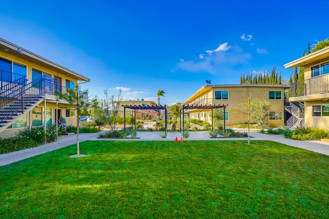 Lawn - Apartments close to Downtown LA with Gym, BBQ Area, Laundry Facilities and More!