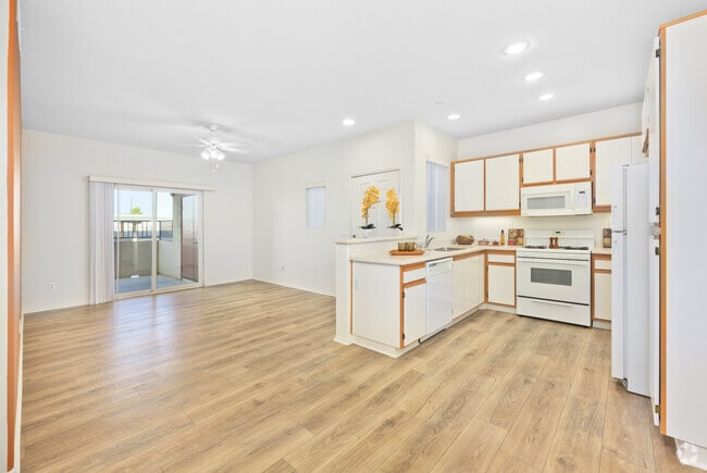 2BR, 2BA - 926SF - Kitchen and Living Room - La Mirage