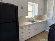 Photo - 1170 E 55th St Townhome