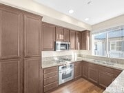 Photo - Modern 3-Story Townhome in Bay Park – 3BR/3.5BA with Pool, Balcony & In-Unit Laundry