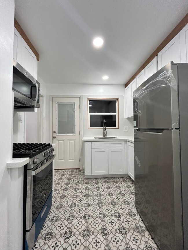 Spacious kitchen, completely renovated! - 1537 Freeman Ave House