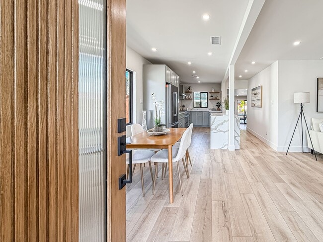 Photo - Upgraded 3+2 w/pool, gourmet kitchen + family room!