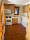 Kitchen tiled. Dishwasher. - 6206 Temple Hill Dr Unit Lower