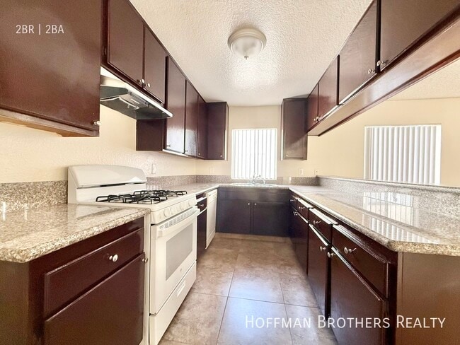 Building Photo - 8926 Burnet Ave Unit 227