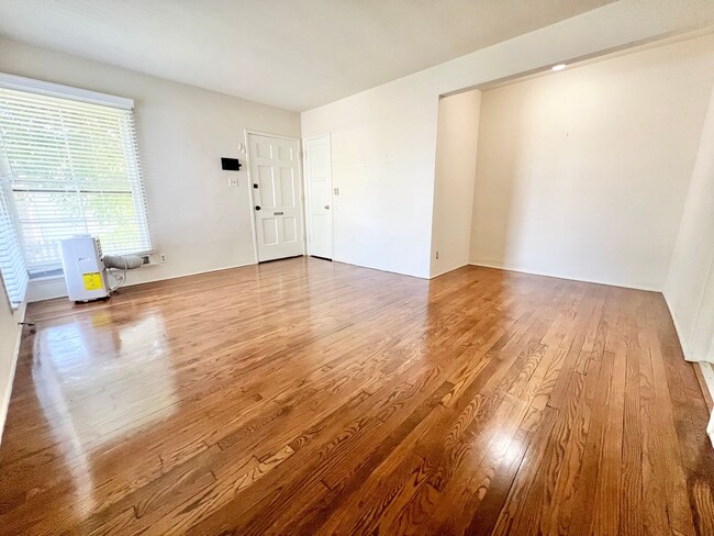 Photo - Charming 2-Bedroom Home with Hardwood Floors & Fireplace Near the Traffic Circle Unit 4510 E 15th St
