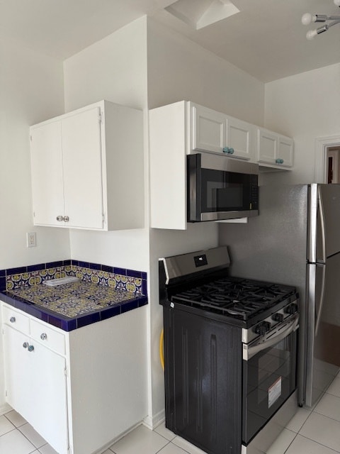 new stainless microwave and stove - 232 N Clark Dr