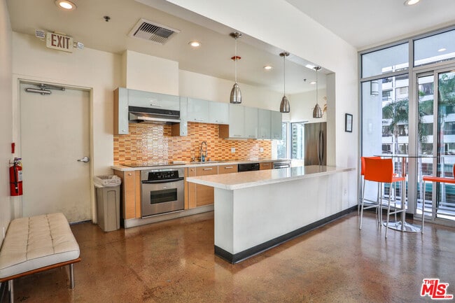 Photo - 645 W 9th St Unit 201
