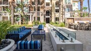 Kick back and socialize in the stylish outdoor lounge designed for comfort and connection. - Valentia by Windsor Apartments