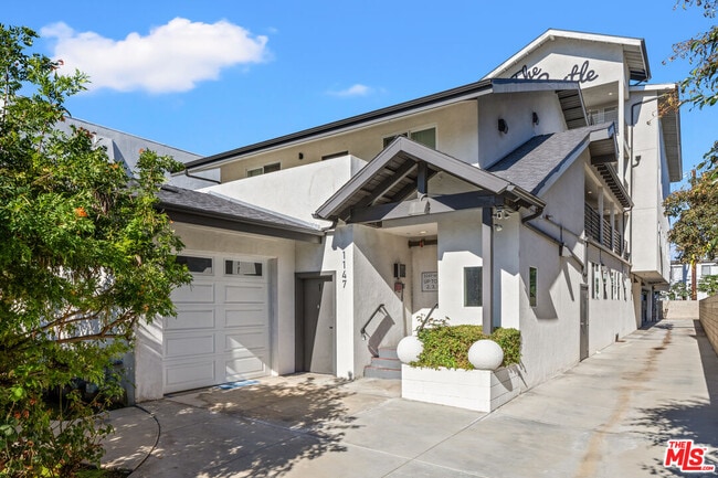 Building Photo - 1147 W 37th St Unit 1