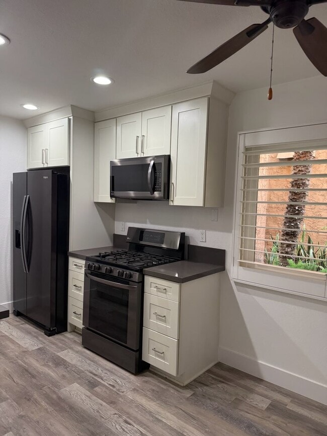 Photo - 6600 Warner Ave Unit 119