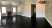 Fireplace; hardwood flooring throughout; alabaster dining chandelier in dining room. - 97 Corsica Dr Unit 97