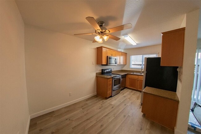 Photo - 2BR/1BA Clairemont Condo Freshly Painted, New Vinyl Plank Flooring Throughout Patio, 1 Parking Space