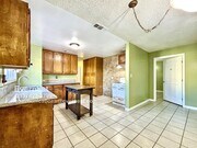 Photo - Charming 3-Bedroom Home with Fenced Yard a...