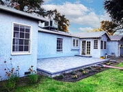 Back of the house with paved patio - 15341 Cohasset St