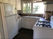 Full kitchen with large windows with views of mountains - 2188 Latimer Ln House