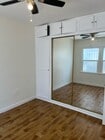 Bedroom and closet - 1222 S Dunsmuir Ave Apartments