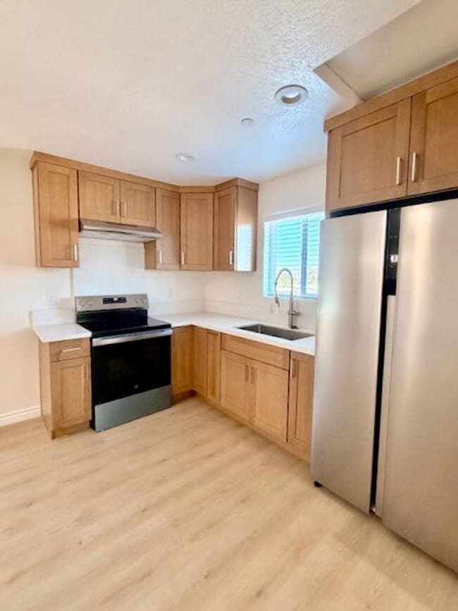 Building Photo - Spacious 3BR/2BA Home with Open Floor Plan, Garage & Washer/Dryer Unit Upstairs ADU