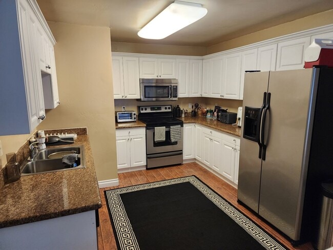 Photo - Upstairs end unit with AC and a private entrance 2 bedroom condo in a quiet area of Spring Valley... Unit 5