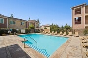Resident Pool with Lounge Seating - Turtle Creek Apartments