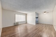 2BR, 2BA - 842SF - Living Room - The Burbank Towers
