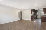 entry to living room and kitchen with new recessed lighting and new heater - 4091 Rosecrans Ave