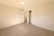 Photo - Recently Renovated, Single-Level 2-Bedroom Apartment with Small Fenced Yard. Unit O