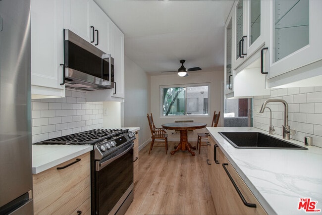 Building Photo - 3637 Glendon Ave Unit 104