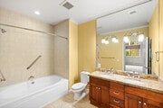 2BR, 2BA - 1294SF - Bathroom - Serrano Luxury Homes and Garden