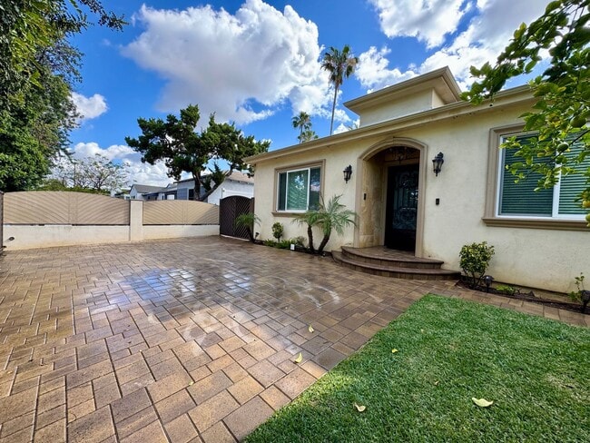 Building Photo - Peaceful North Hollywood street, charming three-bedroom, three-bathroom residence
