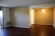 Two Bedroom 1 bath Living room and dining room - 105 Monterey Pines Apartments