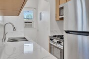 Unit E - Fully Renovated Kitchen - 123 N. Hamilton Dr. Apartments