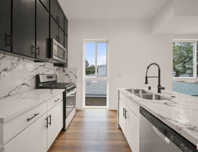 Photo - 8664 Cadillac Ave Townhome