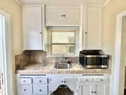 Photo - Cute North Park Bungalow! 2bd/1ba, 1 car garage, AC, W/D in-unit, fenced yard!