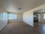 Photo - 3 Bedroom 2 Bathroom House with Central A/C , 2 Car Garage and Beautiful Backyard with Covered Patio