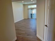 Walking into living room - 8 Town and Country Rd