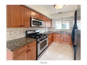 Photo - Pet friendly three-story townhouse-style c... Unit G