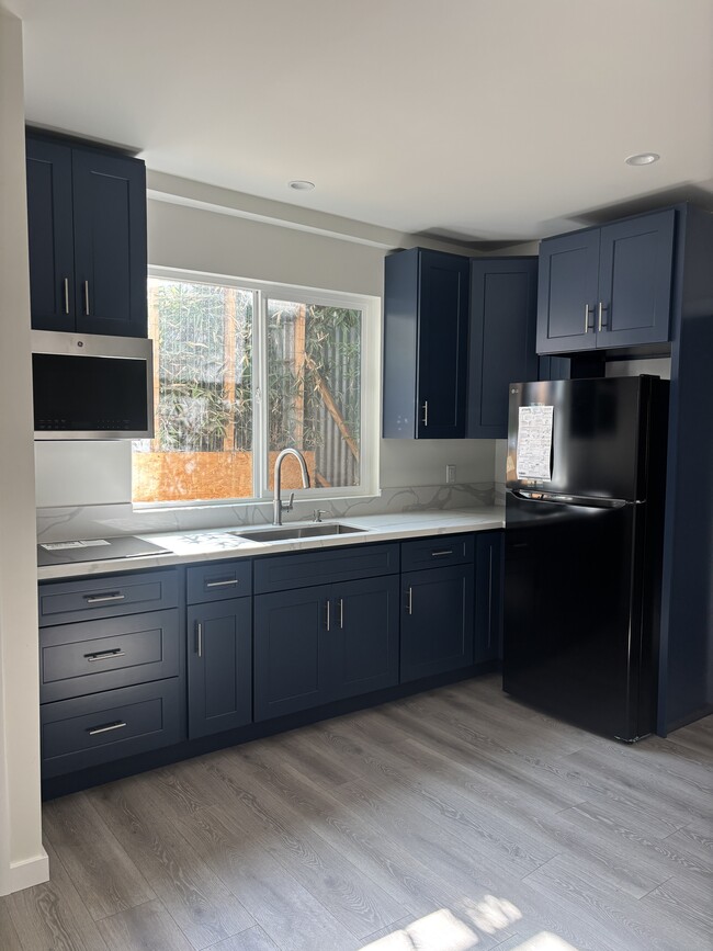 Kitchen - NASA Living LLC Apartments