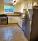 Kitchen with Custom Wood Cabinets - 2026 -2028 Clyde Ave