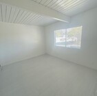Unit 6 Living Room - 6565 Segovia Rd