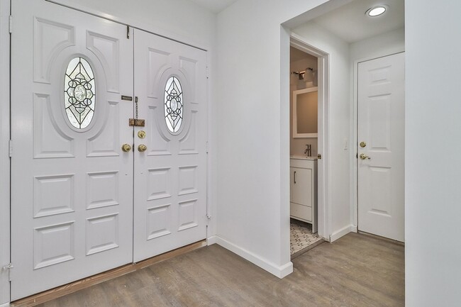 Photo - MOVE-IN READY 5BR w/pool + guest unit w/half bath!