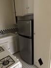 Kitchen with Stove and Refrigerator With Custom Tile Floors - 824 1/2 S Curson Ave Apartments Unit 824 1-2